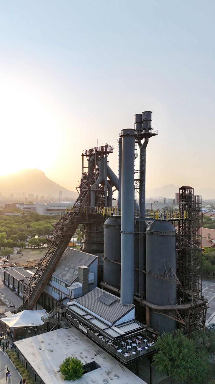 sunset industrial landscape with steel plant